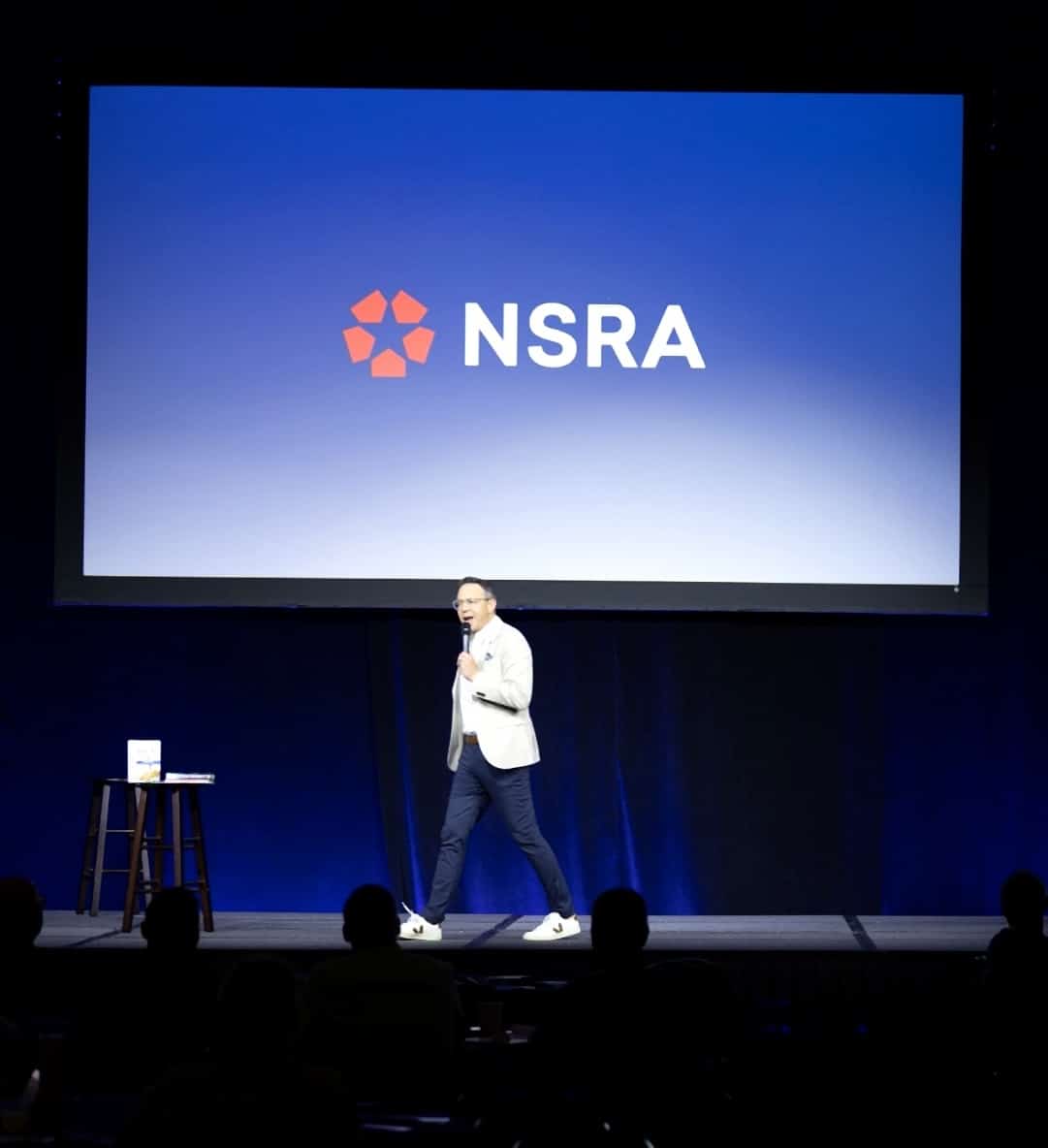 Craig Felker speaking on stage at NSRA event